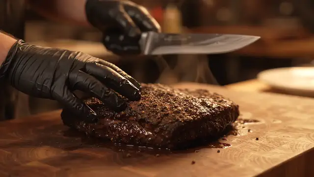 Smoked brisket being sliced